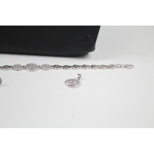 2318 - A .925 silver necklace, bracelet, pendant and earrings set - approx. gross weight 33g