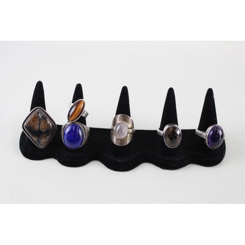 2328 - A collection of silver gemstone set cocktail rings - approx. gross weight 66g