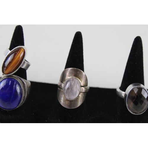 2328 - A collection of silver gemstone set cocktail rings - approx. gross weight 66g