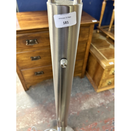 128 - A modern brushed steel standard lamp - approx. 180cm high