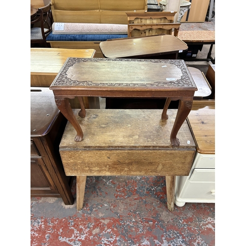 217 - Two tables, one Indian carved teak occasional and one mid 20th century oak and beech drop leaf