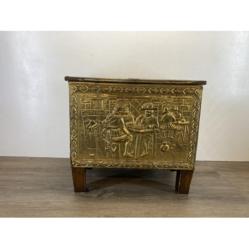 428 - A mid 20th century embossed brass coal store - approx. 41cm high x 46cm wide x 31cm deep