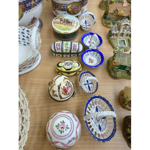 364 - A collection of ceramic trinket boxes and lacework baskets to include Past Times, Crown Porcelain et... 