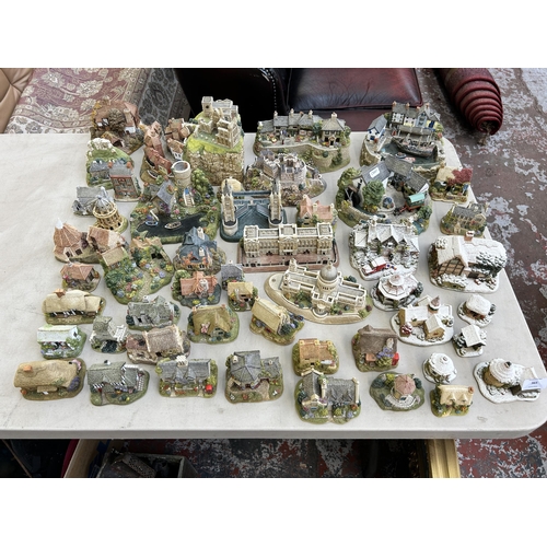 Approx. 49 Lilliput Lane sculptures to include Whitby Harbour limited edition no. 426 of 850, The Golden Hind Brixham limited edition 560 of 1500, Britain's Heritage Edinburgh castle, Go With The Flow limited edition no. 102 of 850 etc.