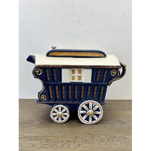 368 - Four The Teapottery ceramic novelty teapots to include limited edition 999/4000 Romany Caravan etc.