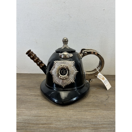 371 - Four the Teapottery ceramic novelty teapots to include limited edition 1503/3000 French stove etc.