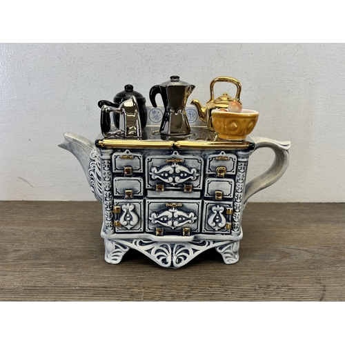 371 - Four the Teapottery ceramic novelty teapots to include limited edition 1503/3000 French stove etc.