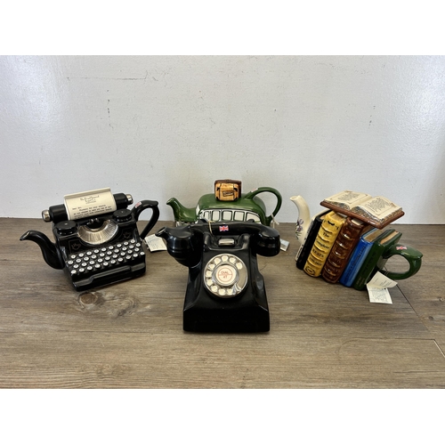 375 - Four Tony Carter ceramic novelty teapots