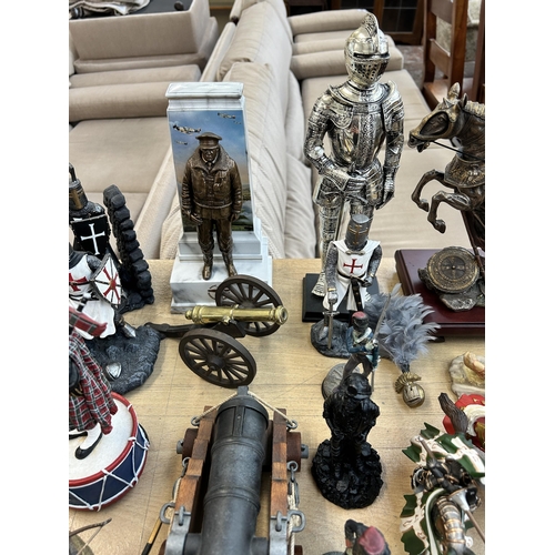 377 - A collection of military themed ceramics and collectables to include Franklin Mint Samurai hand pain... 