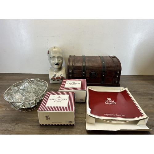 379 - A collection of items to include ceramic phrenology head, two boxed pairs of Royal Albert Crystal Vi... 