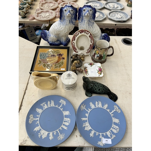 386 - A collection of ceramics to include two Wedgwood pale blue Jasperware collector's plates, Royal Albe... 