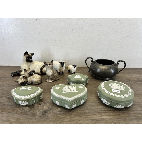 389 - Ten items, four pieces of Wedgwood sage green Jasperware, five Beswick animal figurines and one pewt... 