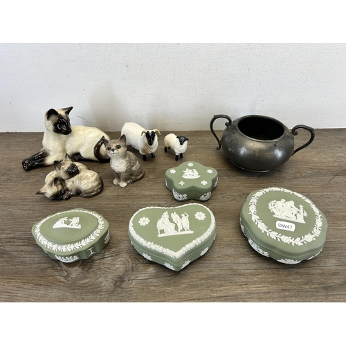 389 - Ten items, four pieces of Wedgwood sage green Jasperware, five Beswick animal figurines and one pewt... 