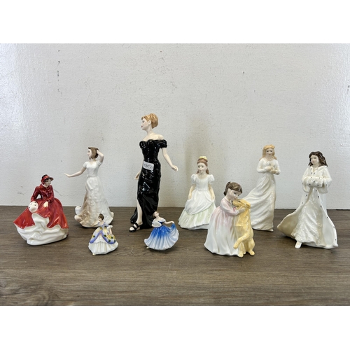 393 - Nine Royal Doulton figurines to include Emma HN3208, Buddies HN3396, Christmas Day HN3488, Classics ... 