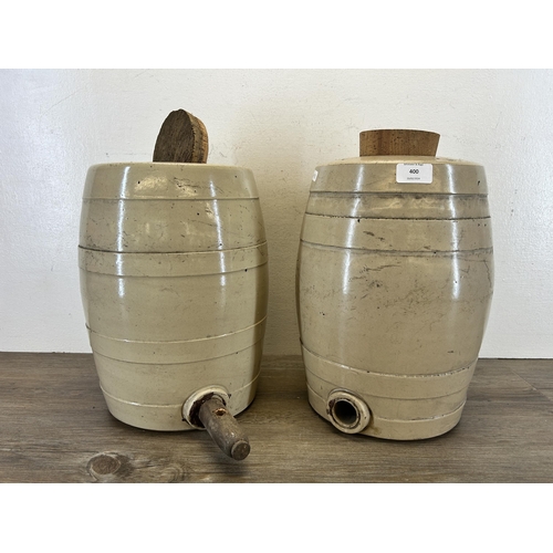 400 - A pair of early 20th century stoneware barrels - approx. 37cm high