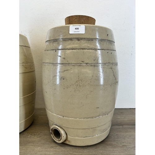 400 - A pair of early 20th century stoneware barrels - approx. 37cm high