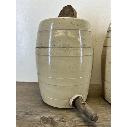 400 - A pair of early 20th century stoneware barrels - approx. 37cm high