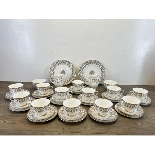 404 - A collection of Royal Grafton Regency bone china to include twelve teacups, twelve saucers, twelve s... 