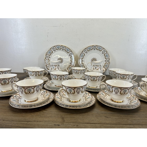 404 - A collection of Royal Grafton Regency bone china to include twelve teacups, twelve saucers, twelve s... 