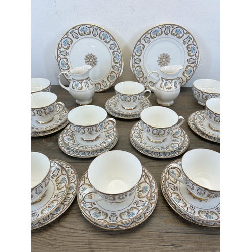 404 - A collection of Royal Grafton Regency bone china to include twelve teacups, twelve saucers, twelve s... 