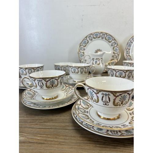 404 - A collection of Royal Grafton Regency bone china to include twelve teacups, twelve saucers, twelve s... 