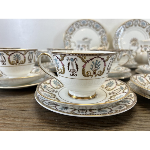 404 - A collection of Royal Grafton Regency bone china to include twelve teacups, twelve saucers, twelve s... 