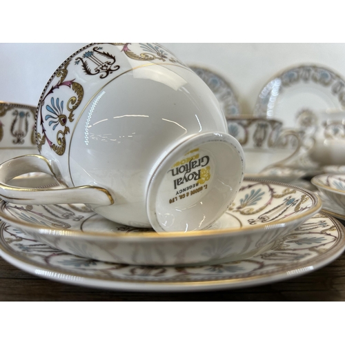 404 - A collection of Royal Grafton Regency bone china to include twelve teacups, twelve saucers, twelve s... 