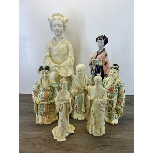 406 - Seven Past Times resin figurines - largest approx. 65cm high