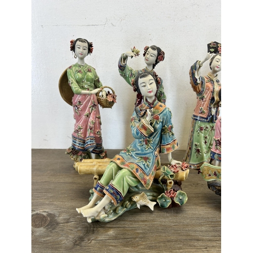 410 - Six Chinese Shiwan Wucai porcelain figurines - largest approx. 31cm high