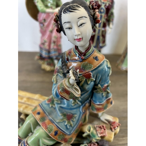 410 - Six Chinese Shiwan Wucai porcelain figurines - largest approx. 31cm high