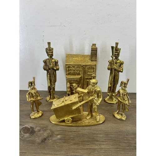 425 - Six brass figurines - largest approx. 29cm high