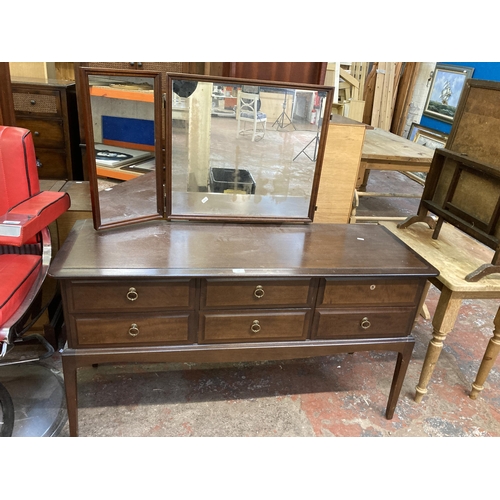 110 - A Stag Minstrel mahogany dressing table