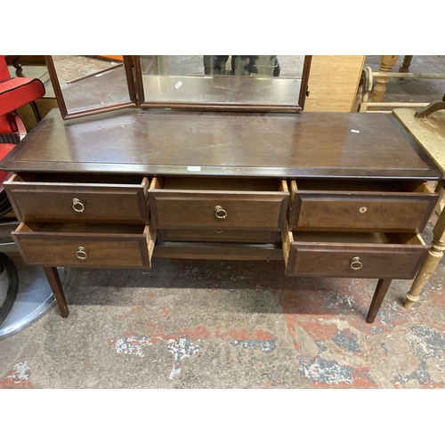 110 - A Stag Minstrel mahogany dressing table