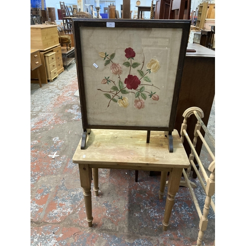 111 - Two pieces of furniture, one mid 20th century oak framed floral embroidered fire screen and one Vict... 