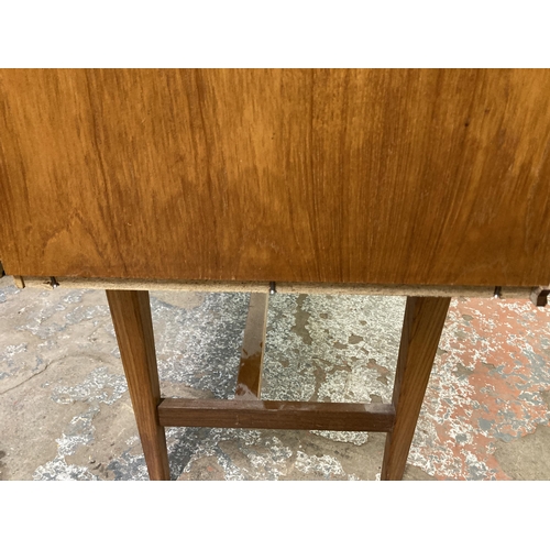 112 - A mid 20th century Gimson & Slater Ltd. Vesper Furniture teak dressing table
