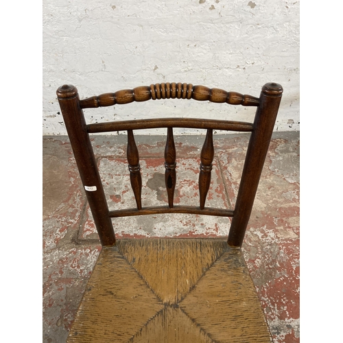 116 - Three elm and rush seated occasional chairs, one 19th century and two 19th century style ladderback