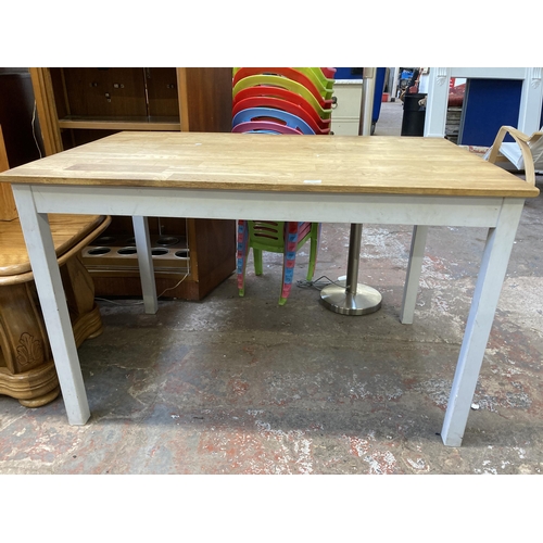 127 - A modern oak and grey painted dining table - approx. 75cm high x 76cm wide x 118cm long