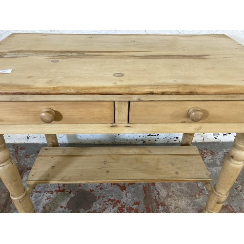 137 - A Victorian pine two drawer wash stand - approx. 73cm high x 95cm wide x 52cm deep