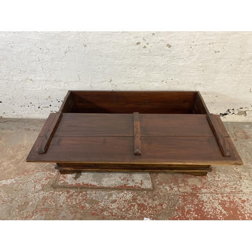 138 - An Indian hardwood twelve drawer coffee table - approx. 43cm high x 64cm wide x 118cm long