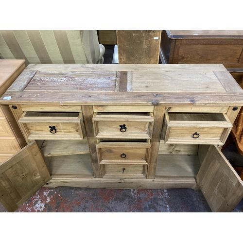 152 - A Mexican pine sideboard - approx. 84cm high x 132cm wide x 45cm deep