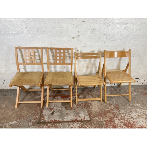 161 - Four beech folding chairs