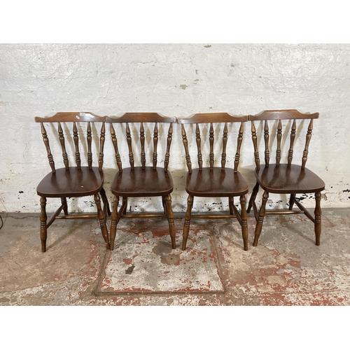 163 - Four elm and beech spindleback dining chairs