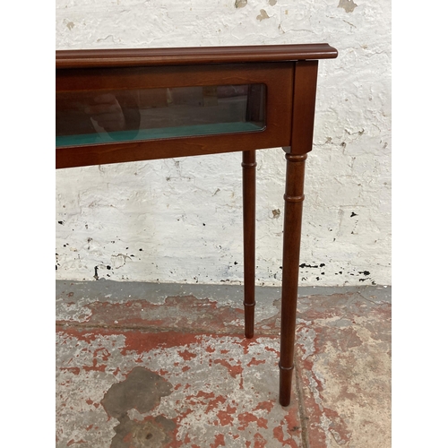 21 - A mahogany bijouterie table - approx. 69cm high x 60cm wide x 29cm deep