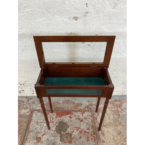 21 - A mahogany bijouterie table - approx. 69cm high x 60cm wide x 29cm deep