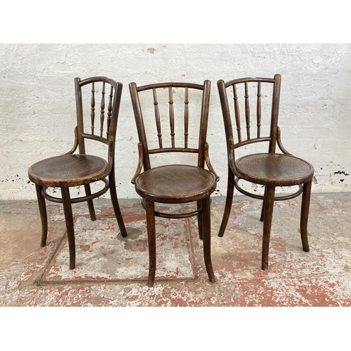 26 - Four early 20th century beech and bentwood occasional chairs, three Mundus and one Penny seat