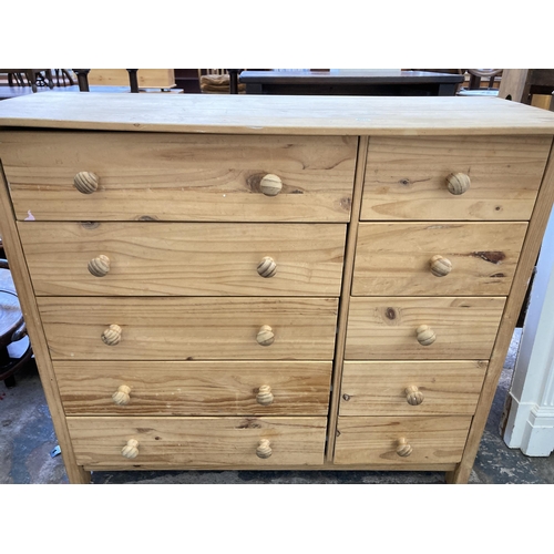 27 - A pine chest of drawers - approx. 94cm high x 105cm wide x 40cm deep