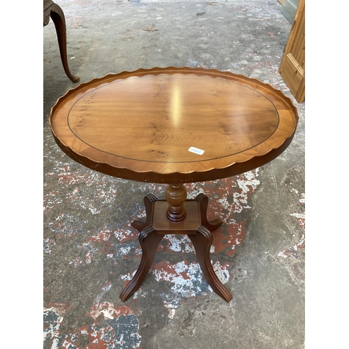 40 - Five pieces of occasional furniture to include Georgian style yew wood oval pedestal side table, oak... 