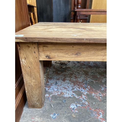 47 - An Indian sheesham wood coffee table