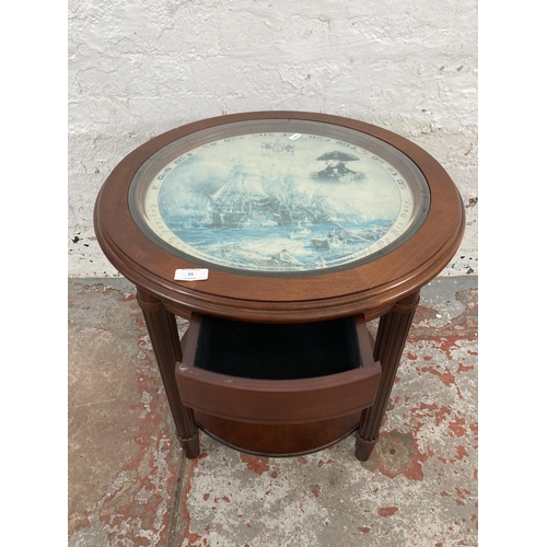 55 - A Danbury Mint The Trafalgar mahogany and glass side table - approx. 55cm high x 56cm diameter