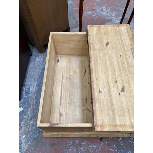 60 - A pine square storage coffee table - approx. 40cm high x 90cm square
